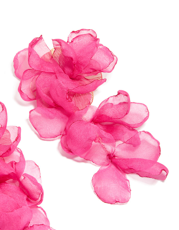 Crafted from fabric, these statement drop earrings feature floral design in hot pink and light pink post detail view