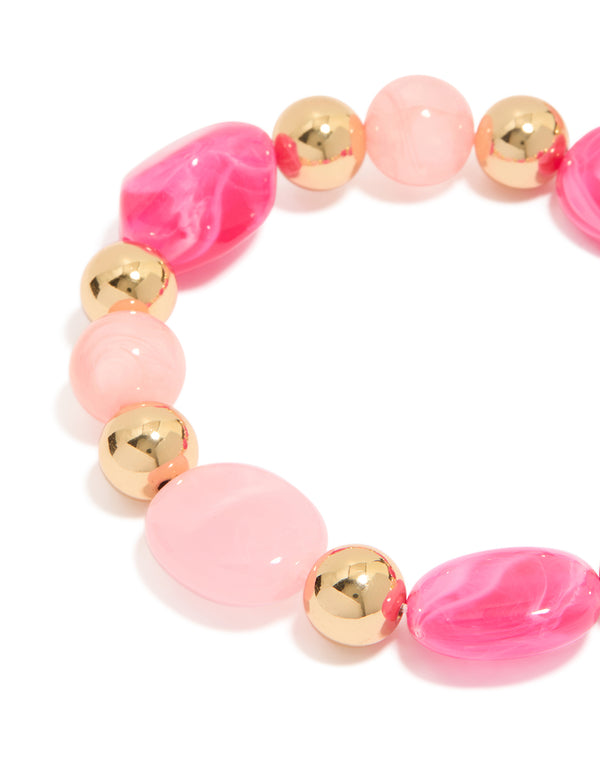 Featuring beaded stretch bracelet in hot pink, light pink, and gold acrylic 2-pack close up view