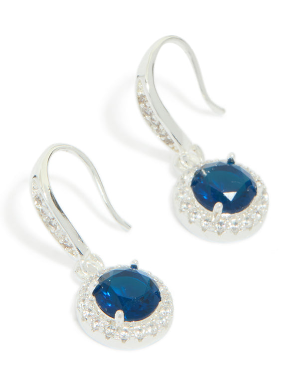 Showcasing drop earrings with halo cut cubic zirconia in sapphire blue, crafted from plated material front view