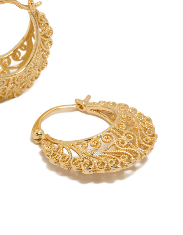 Highlighting gold plated boho patterned hoop earrings with textured surface and latch closure post detail view