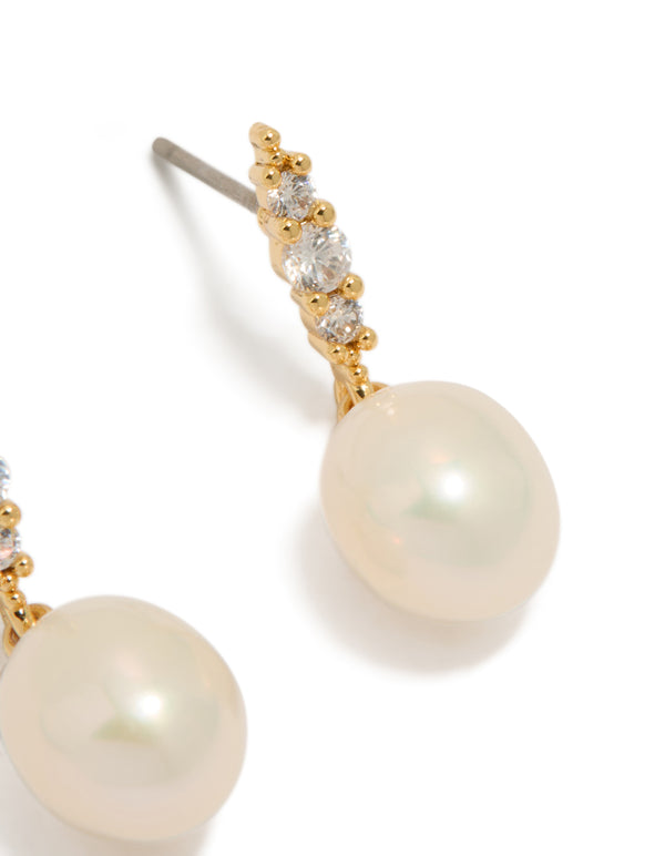 Beautifully crafted statement gold plated cubic zirconia and freshwater pearl drop earrings post detail view