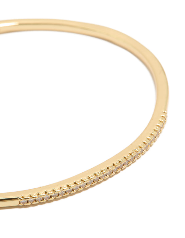 Detailed look at a gold plated cubic zirconia thin wrist cuff bangle close up view