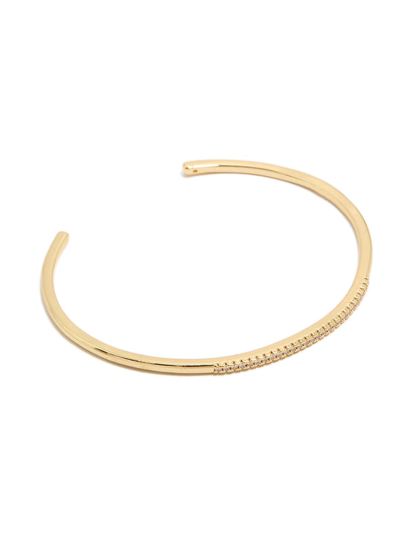 Showcasing a gold plated cubic zirconia thin wrist cuff bangle front view
