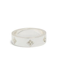 Showcasing a waterproof stainless steel band ring with cubic zirconia floral feature in silver and white, dainty style front view - link has visual effect only