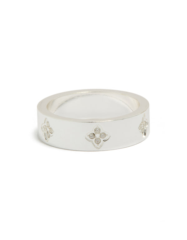 Showcasing a waterproof stainless steel band ring with cubic zirconia floral feature in silver and white, dainty style front view