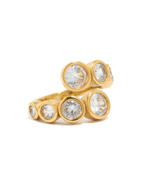 Showcasing a waterproof gold stainless steel ring featuring cubic zirconia bezel wrap design front view - link has visual effect only