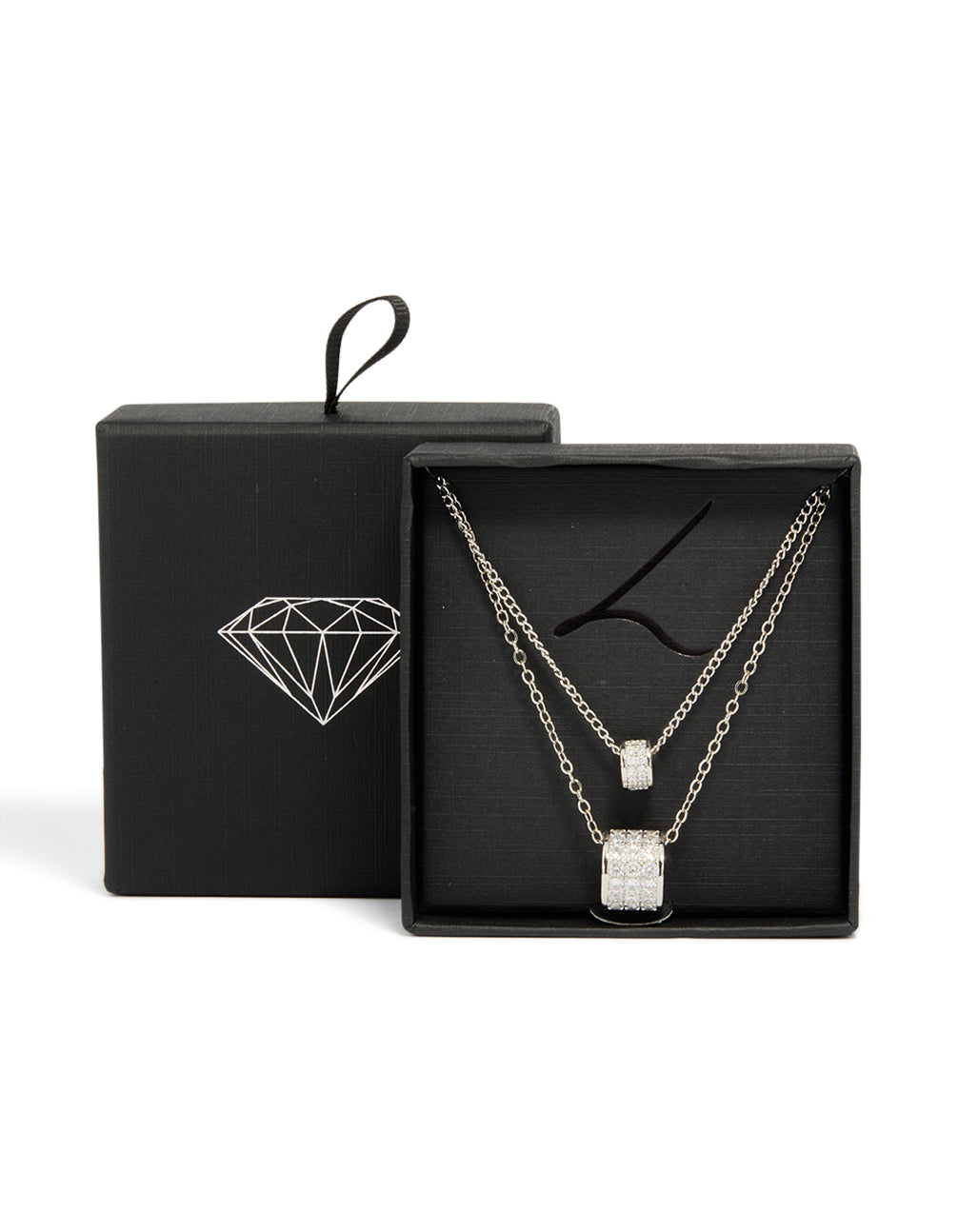 Showcasing a necklace crafted from cubic zirconia with layered rondelle design in silver close up view