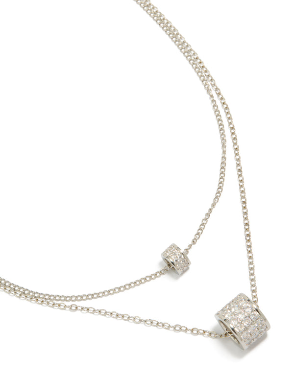 Showcasing a necklace crafted from cubic zirconia with layered rondelle design in silver close up view