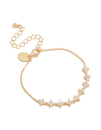 Showcasing a charm floral cubic zirconia bracelet in gold with a statement style front view - link has visual effect only