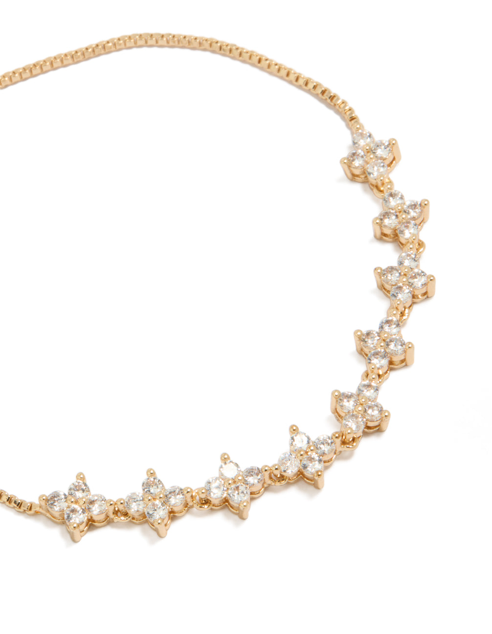 Gold cubic zirconia fine floral bracelet with dainty style close up view