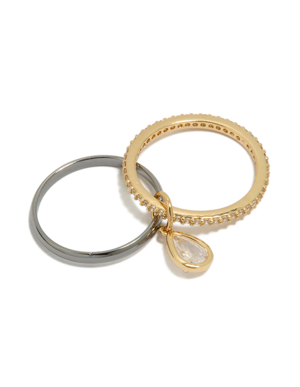 Crafted from mixed metal plated cubic zirconia band and stacked ring with charm in gold and silver close up view