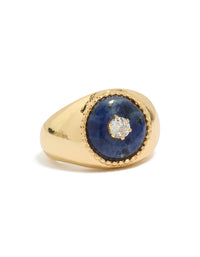 Showcasing a gold plated chunky cubic zirconia blue stone ring with statement styling front view - link has visual effect only