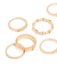 Statement gold signet and ribbed rings showcasing celestial star in a 10-pack close up view - link has visual effect only