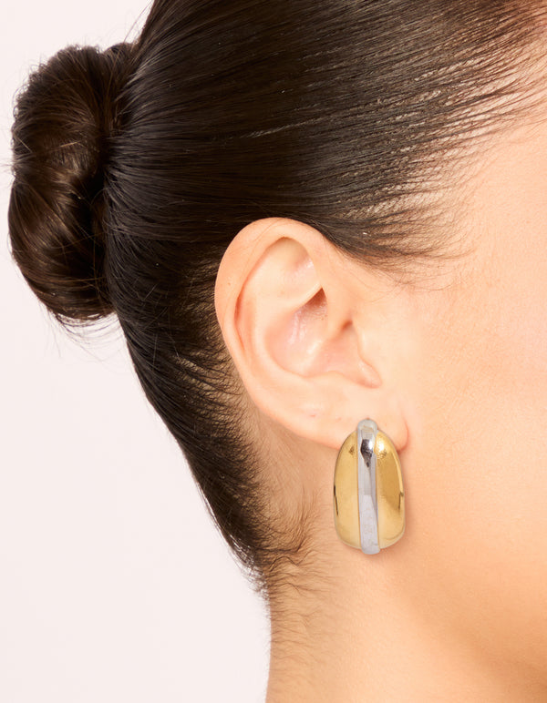Discover waterproof mixed plated stainless steel hoop earrings in silver and gold on ear view