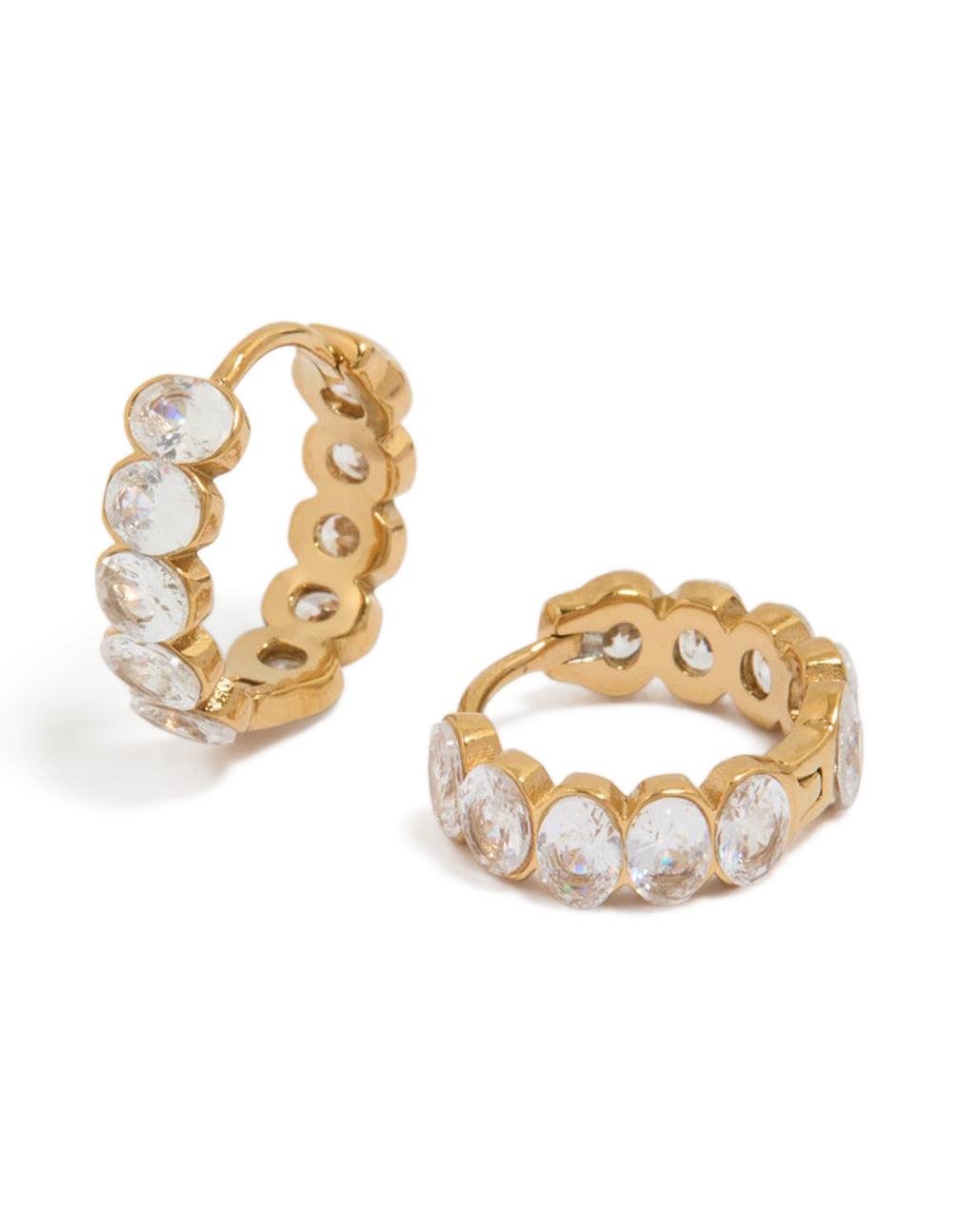 Beautifully crafted waterproof huggie earrings featuring round bezel set cubic zirconia stones in stainless steel with a gold plated finish front view