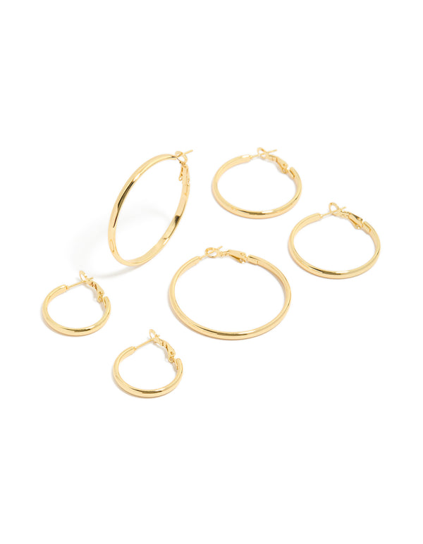 Featuring waterproof gold plated stainless steel wide round hoop earrings in a 3-pack front view