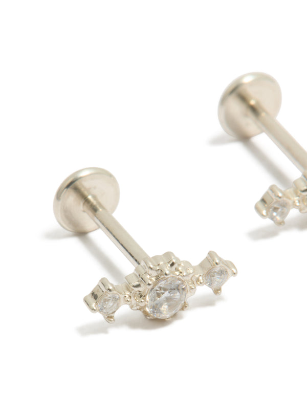 Showcasing waterproof stainless steel textured cubic zirconia trio flat back stud earrings in silver and clear close up view