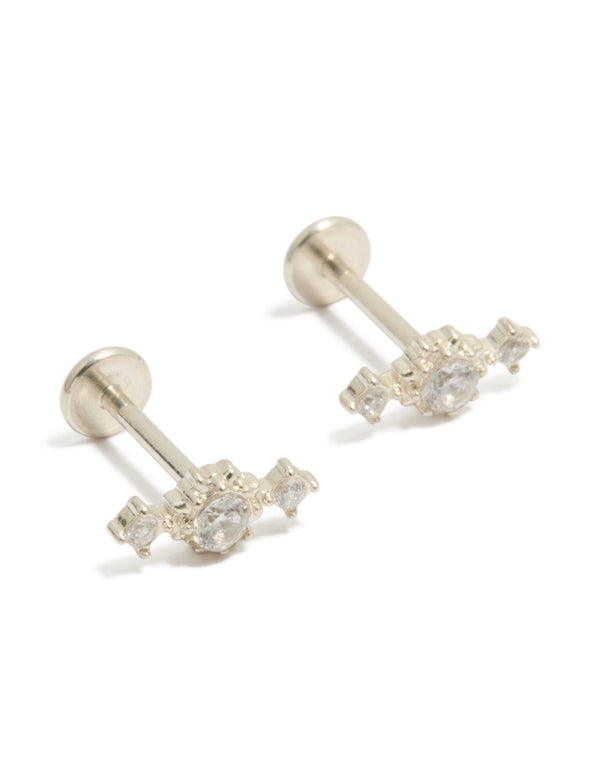 Featuring waterproof stainless steel textured cubic zirconia trio flat back stud earrings in silver and clear front view
