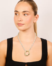 Crafted from waterproof mixed metal plated stainless steel, this organic round pendant necklace in gold and silver on model view - link has visual effect only