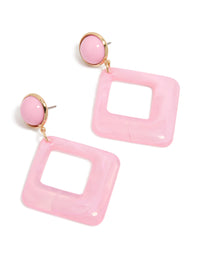 Showcasing statement drop earrings in gold and pink with acrylic diamond shaped design front view - link has visual effect only