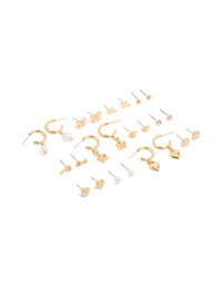 Discover this dainty stud earrings 12-pack with featuring bow, cross, floral, balls and heart designs enamel crafted in gold with pearl accents white and pink details front view - link has visual effect only