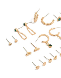 Discover gold green diamante stud earrings 12-pack with balls, pearl and heart details, huggie closures in white and gold tones close up view - link has visual effect only