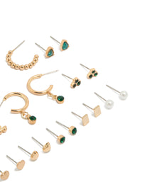 Discover gold green diamante stud earrings 12-pack with balls, pearl and heart details, huggie closures in white and gold tones close up view - link has visual effect only