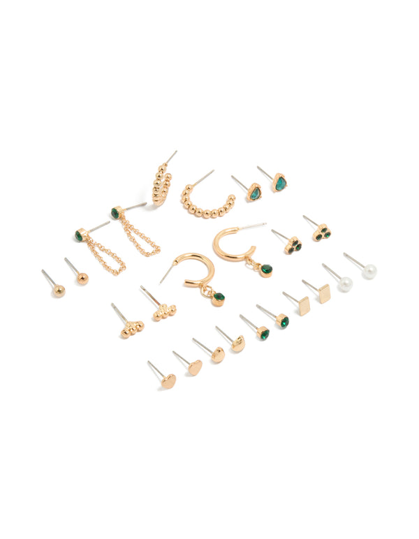 Showcasing a gold green diamante stud earrings 12-pack featuring pearl, heart and balls accents in huggie closures in white and gold tones front view