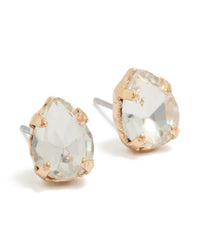 Showcasing gold teardrop diamante stud earrings with clear stones in front view - link has visual effect only