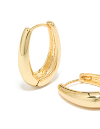 Featuring gold plated skinny teardrop hoop earrings with closure mechanism in close up view - link has visual effect only