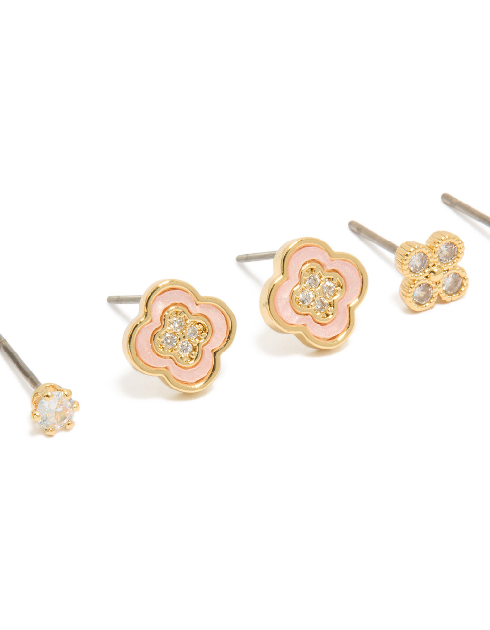 Highlighting gold plated cubic zirconia flower stud earrings in a 3-pack with crystal features, and stud closure close up view