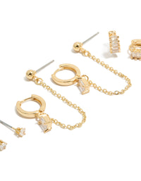 Showcasing gold plated baguette chain and huggie earrings 4-pack featuring crystal cubic zirconia stud closure close up view - link has visual effect only