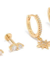 Displaying celestial charm pack with star accents, cubic zirconia crystals, flat back studs and huggie closures in gold plated brass close up view - link has visual effect only