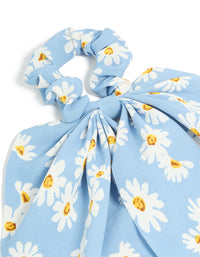 Featuring a sky blue daisy printed scarf scrunchie with floral print in white and yellow side view - link has visual effect only