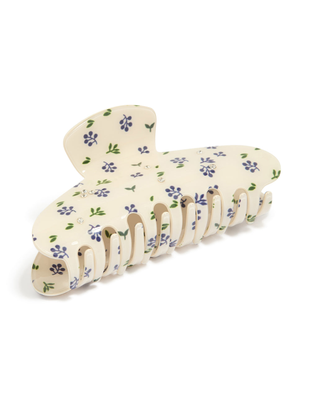 Showcasing a tweens acrylic diamante and flower print hair claw clip with floral leaf details in wheat, slate blue, dark olive green, and chunky styling detail view