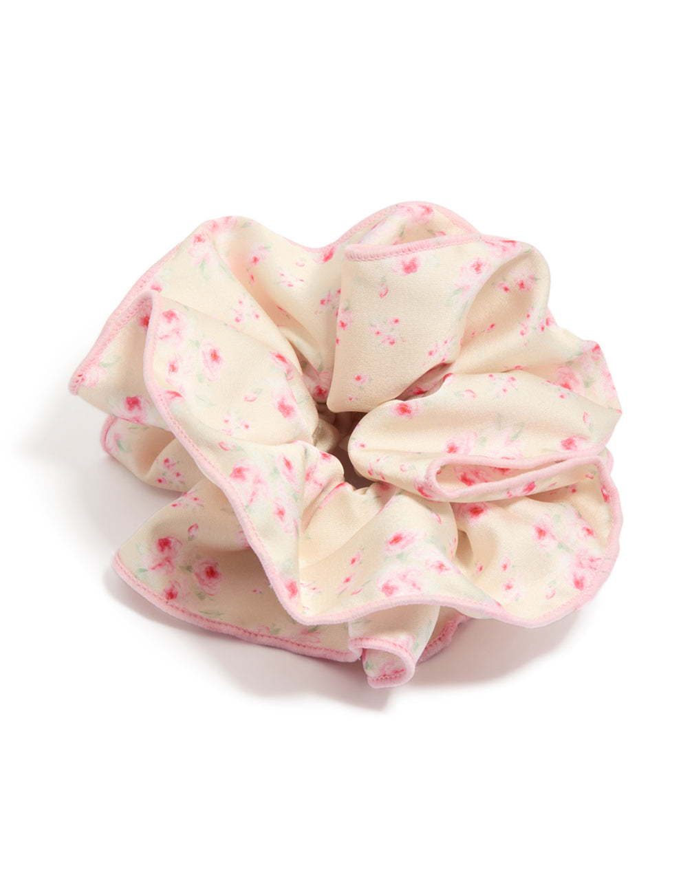 Crafted with floral print in misty rose, pink, and light pink tones, this Tweens Rose Daisy Scrunchie is shown in a front view
