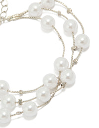 Crafted with silver pearl layering and in white close up view - link has visual effect only