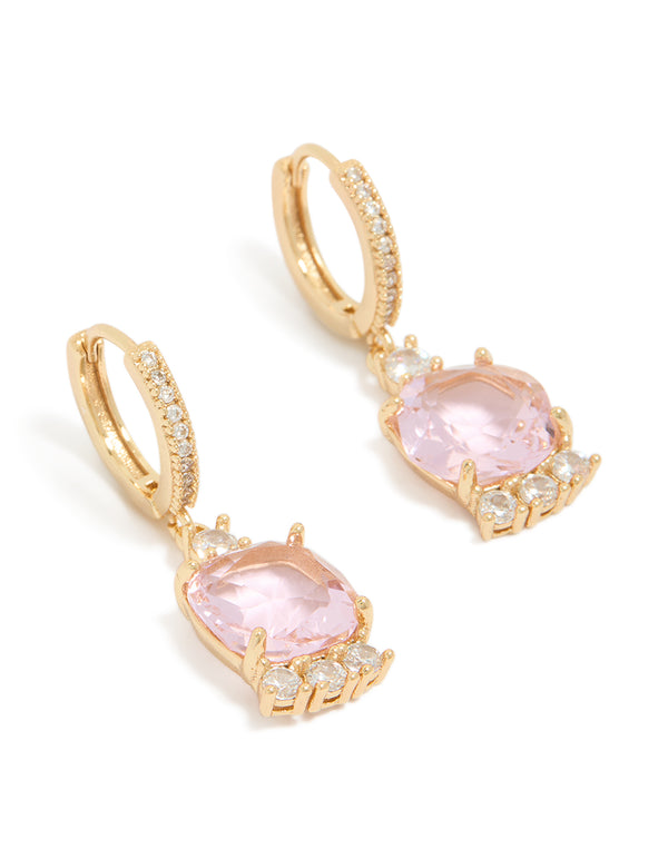 Showcasing gold pink cubic zirconia square huggie earrings in statement style with clear accents front view