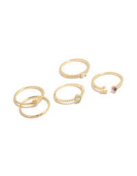 Stunning five-piece celestial set featuring moon and sun motifs in gold plated cubic zirconia oval cut dainty rings front view - link has visual effect only