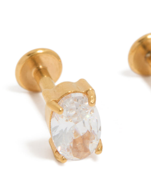 Showcasing oval cut cubic zirconia in gold plated surgical steel with flat back stud closure close up view
