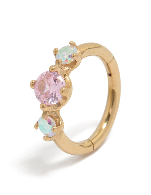 Featuring a gold plated surgical steel multi cubic zirconia circle clicker ring with crystal in pink and aqua front view