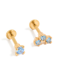 Showcasing gold plated titanium flat back studs featuring blue cubic zirconia crystals front view - link has visual effect only