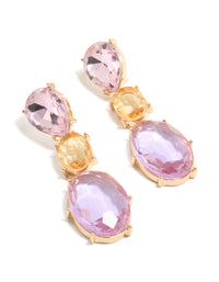 Showcasing statement drop earrings with oval cut stones in purple and orange hues set in gold front view - link has visual effect only