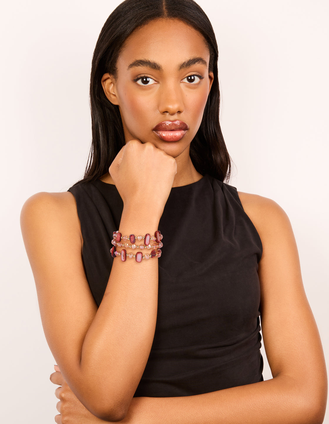 Designed with beaded stretch construction in pink, light coral, gold, and indian red, 3-pack on model view
