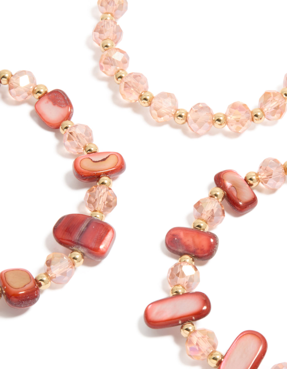 Showcasing beaded stretch bracelets in pink, light coral, gold, and indian red tones, 3-pack close up view