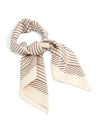Showcasing a cream brown geometric wavy lines fabric scarf in cornsilk front view - link has visual effect only