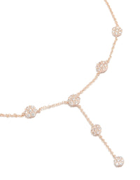 Showcasing a rose gold cubic zirconia mini floral y-necklace with charm featuring dainty pattern close up view - link has visual effect only