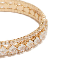 Elegant gold cubic zirconia circle statement cuff bangle close up view - link has visual effect only