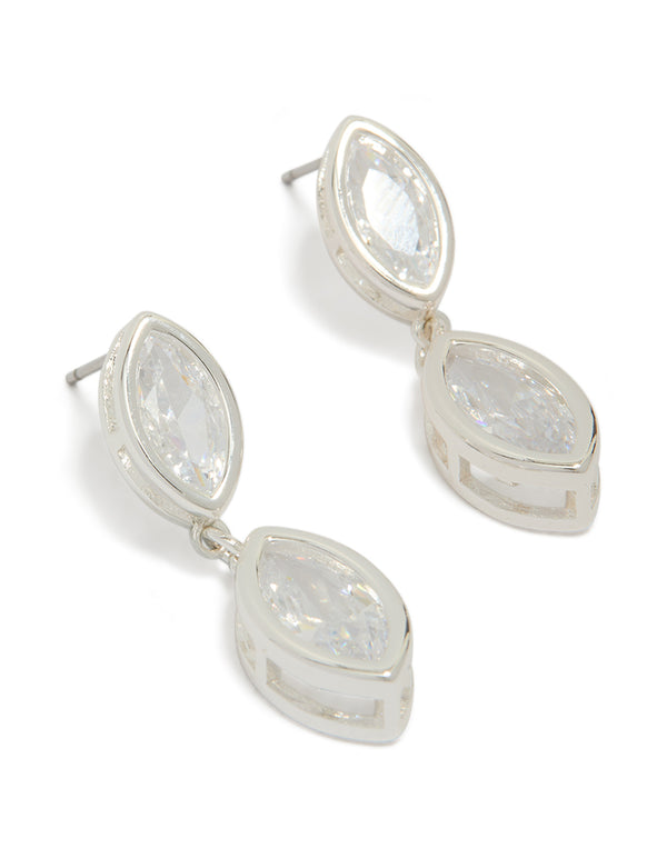Showcasing silver plated cubic zirconia double oval bezel drop earrings with clear stones in front view