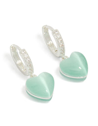 Discover silver plated pave blue heart drop earrings with a hoop closure in pale turquoise front view - link has visual effect only